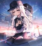  1girl absurdres anchor_symbol black_headwear black_sailor_collar black_skirt black_thighhighs blue_eyes blush brown_footwear dfd flat_cap grey_hair hair_between_eyes hat hibiki_(kancolle) highres kantai_collection long_hair long_sleeves machinery open_mouth pleated_skirt rigging sailor_collar school_uniform serafuku shoes sitting skirt smokestack solo thighhighs turret wariza 