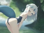  1girl absurdres ahoge ass bare_arms bare_shoulders blue_eyes blue_hair blue_one-piece_swimsuit blunt_bangs blurry blurry_background commentary day english_commentary fins fish_tail gawr_gura grey_hair hair_ornament highres hololive hololive_english leaning_forward light_blush long_hair looking_at_viewer lucasyecla99 multicolored_hair one-piece_swimsuit one_eye_closed one_side_up outdoors parted_lips river shark_girl shark_hair_ornament shark_tail solo streaked_hair sunlight swimsuit tail virtual_youtuber water 
