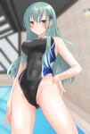  1girl aqua_eyes aqua_hair ass_visible_through_thighs black_one-piece_swimsuit breasts competition_swimsuit covered_navel cowboy_shot day hair_ornament hairclip hand_on_own_hip highres indoors kantai_collection long_hair looking_at_viewer medium_breasts multicolored_clothes multicolored_swimsuit nitamako_(sakamalh) one-piece_swimsuit pool rei_no_pool solo suzuya_(kancolle) swimsuit two-tone_swimsuit water 