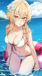  1girl absurdres bikini blonde_hair breasts cloud collarbone commentary crossed_bangs day english_commentary flower genshin_impact hair_flower hair_ornament highres innertube large_breasts leaning_forward looking_at_viewer lumine_(genshin_impact) navel ocean orange_eyes outdoors parted_lips sidelocks solo stomach swimsuit thighs wading water white_flower zeragoes 