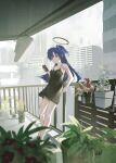  1girl balcony bare_arms bare_legs black_camisole blue_archive camisole cellphone cityscape clothesline halo highres holding holding_phone mechanical_halo parted_bangs phone plant potted_plant purple_eyes purple_hair railing shirt sidelocks smartphone solo two_side_up white_shirt yomoyama55 yuuka_(blue_archive) 