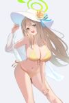  1girl bikini blonde_hair blue_archive blush breasts cleavage dusk_wanshang flower front-tie_bikini_top front-tie_top green_eyes green_halo hair_over_breasts halo hand_on_headwear hand_on_own_thigh hand_up hat hat_flower highres large_breasts long_hair looking_at_viewer nonomi_(blue_archive) nonomi_(swimsuit)_(blue_archive) official_alternate_costume open_mouth see-through see-through_shirt side-tie_bikini_bottom simple_background solo string_bikini sun_hat swimsuit white_background white_headwear yellow_bikini 