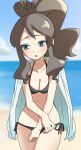  1girl :o absurdres alternate_costume asamaru1225 beach bikini black_bikini blurry blurry_background blush breasts brown_hair cleavage cloud collarbone commentary_request cowboy_shot day green_eyes high_ponytail highres hilda_(pokemon) jacket jacket_on_shoulders outdoors parted_lips pokemon pokemon_(game) pokemon_bw raised_eyebrows sand shore sidelocks sky solo swimsuit water 