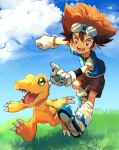  1boy :d agumon blue_footwear brown_eyes brown_hair brown_shorts clenched_hand cloud day digimon digimon_(creature) digimon_adventure digivice gloves goggles grass green_shirt hair_between_eyes happy highres holding male_focus open_mouth outdoors running sharp_teeth shirt short_sleeves shorts smile socks stim_yyy teeth tongue white_footwear white_socks yagami_taichi 