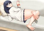  1girl absurdres bare_legs barefoot black_hair black_skirt blue_eyes cardigan couch feet foot_focus gridman_universe highres long_hair looking_at_viewer looking_back mbr90munouk miniskirt orange_scrunchie panties scrunchie skirt soles ssss.gridman takarada_rikka thighs toes underwear white_cardigan white_panties wrist_scrunchie 