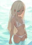  1girl aqua_eyes bare_shoulders bikini blonde_hair breasts cleavage closed_mouth collarbone dark-skinned_female dark_skin idolmaster idolmaster_cinderella_girls idolmaster_cinderella_girls_starlight_stage in_water layla_(idolmaster) long_hair looking_at_viewer navel sawarakajin small_breasts smile solo swimsuit white_bikini 