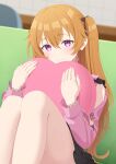  1girl black_skirt blurry blurry_background boncha closed_mouth clothing_cutout commentary_request couch hair_between_eyes heart heart_pillow highres hugging_object knees_up konoe_kanata long_hair long_sleeves looking_at_viewer love_live! love_live!_nijigasaki_high_school_idol_club mixed-language_commentary on_couch orange_hair pillow pillow_hug pink_shirt purple_eyes shirt shoulder_cutout sitting skirt smile solo thighs two_side_up 