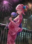  1girl aerial_fireworks bag bagged_fish blue_eyes blue_flower blue_sash blush bocchi_the_rock! building closed_mouth fence fireworks fish flower gotoh_hitori hair_bun hair_flower hair_ornament hand_fan highres holding holding_fan japanese_clothes kikugawa_roku kimono long_sleeves looking_at_viewer obi paper_fan pink_hair pink_kimono print_kimono river riverbank sash sky skyscraper smile solo standing uchiwa water wide_sleeves yellow_flower 