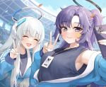  2girls armpits blue_archive breasts closed_eyes grey_hair gya_(144) halo highres jacket leaning_forward long_hair looking_at_viewer medium_breasts multiple_girls noa_(blue_archive) open_clothes open_jacket open_mouth purple_eyes purple_hair selfie sidelocks smile stadium star_sticker sticker_on_face track_jacket upper_body v yuuka_(blue_archive) 