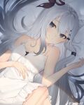  1girl absurdres breasts cone_hair_bun dress grey_eyes grey_hair hair_bun hair_ribbon highres hololive hololive_indonesia long_hair looking_at_viewer lying on_back ribbon small_breasts smile solo spaghetti_strap twitter_username vestia_zeta virtual_youtuber white_dress zinkaa 