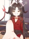  1girl ahoge barefoot black_hair black_shorts blue_archive blurry blurry_background demon_girl demon_horns desk feet foot_focus grin halo highres horns indoors kasumi_(blue_archive) leg_up long_hair looking_at_viewer mountain_han on_desk red_shirt saliva school_desk shirt shorts sitting smile solo toes yellow_eyes 