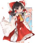  1girl ascot bow dango detached_sleeves food hair_bow hair_tubes hakurei_reimu highres looking_at_viewer ramochi red_bow red_skirt ribbon-trimmed_sleeves ribbon_trim skirt solo touhou wagashi wide_sleeves 