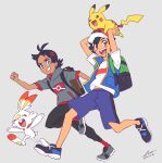  2boys antenna_hair ash_ketchum backpack bag baseball_cap black_hair blue_eyes blue_jacket brown_eyes carrying closed_eyes dark-skinned_male dark_skin goh_(pokemon) grey_background hat highres hood hoodie jacket male_focus midriff_peek multiple_boys pikachu pokemon pokemon_(anime) pokemon_journeys red_socks scorbunny shirt shoes short_sleeves shorts socks tail teeth wedo 