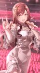  1girl \m/ absurdres bare_shoulders blurry blurry_background blurry_foreground blush breasts brown_hair brown_nails citrusmikan cleavage cleavage_cutout clothing_cutout cowboy_shot detached_sleeves dot_nose dress falling_petals frilled_sleeves frills glowstick grey_ribbon hair_ornament hands_up highres holding holding_microphone idolmaster idolmaster_shiny_colors indoors leaf_hair_ornament long_hair looking_at_viewer microphone open_mouth osaki_amana petals ribbon-trimmed_clothes ribbon_trim sleeveless sleeveless_dress smile solo sparkle stage stage_lights standing striped striped_dress striped_sleeves swept_bangs white_dress yellow_eyes 