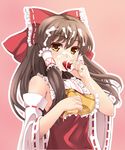  asu_hare bad_id bad_pixiv_id bare_shoulders bow brown_hair colored_eyelashes detached_sleeves food fruit hair_bow hakurei_reimu hands highres holding holding_food holding_fruit long_hair looking_at_viewer orange_eyes pink_background sexually_suggestive simple_background solo strawberry touhou upper_body 