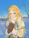  1girl blonde_hair blue_eyes braid crown_braid gloves highres koyo_(koyo00) pointy_ears princess_zelda snow tagme the_legend_of_zelda winter 