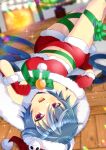  1girl :d blue_hair blurry blurry_background blush bow christmas_tree commentary_request crop_top depth_of_field fang fireplace fur-trimmed_gloves fur-trimmed_headwear fur-trimmed_shorts fur_trim gloves green_bow grey_hair hair_between_eyes hat idol_corp indoors kou_hiyoyo long_hair lying midriff multicolored_hair navel on_back on_floor red_eyes red_gloves red_headwear red_shorts santa_costume santa_hat short_shorts shorts smile solo streaked_hair upside-down very_long_hair virtual_youtuber wooden_floor yuko_yurei 