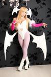  airbrushed asian breasts capcom cleavage cosplay darkstalkers demon_girl highres igarashi_nao morrigan_aensland morrigan_aensland_(cosplay) photo real smile succubus vampire_(game) wings 