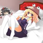  akesaka_iku bed blonde_hair blue_eyes condom condom_in_mouth hat lying moriya_suwako mouth_hold multiple_girls on_back ribbon shameimaru_aya short_hair thighhighs touhou 