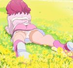  1girl ass boots flower from_behind grass haruyama_kazunori hugtto!_precure lying nono_hana on_back panties pantyshot pantyshot_(lying) pink_footwear pink_skirt precure red_hair short_hair skirt solo underwear white_panties 