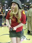  bazooka blonde_hair candid cosplay explosive female grenade hair_ornament hairpin helmet laughing photo red_team rocket skirt smile soldier soldier_(tf2) team_fortress_2 tf2 the_soldier weapon 
