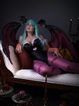  cosplay head_wings lindze lowres lying morrigan_aensland pantyhose photo solo vampire_(game) wings 
