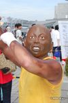  billy_blanks blue_sky building cloud dark_skin dark_skinned_male day mask outdoors photo real_life sky solo_focus what 