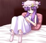  bed blush bococho crescent hat long_hair patchouli_knowledge pillow purple_hair red_eyes socks solo touhou 