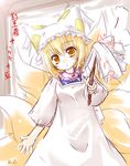  animal_ears blonde_hair cleaning duster hat kazami_karasu long_sleeves pillow_hat short_hair solo touhou translated yakumo_ran yellow_eyes 