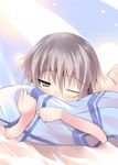  brown_eyes lying nagato_yuki one_eye_closed pillow shiranagi silver_hair solo suzumiya_haruhi_no_yuuutsu 