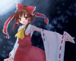  ascot bow brown_eyes brown_hair detached_sleeves hair_bow hair_tubes hakurei_reimu looking_at_viewer night ofuda open_mouth outdoors outstretched_arm red_bow red_ribbon red_skirt ribbon ribbon-trimmed_sleeves ribbon_trim sidelocks skirt skirt_set solo touhou vest 