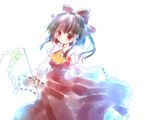  ascot blush brown_hair collar detached_sleeves dress gohei hakurei_reimu holding long_sleeves looking_at_viewer red_dress red_eyes ribbon-trimmed_sleeves ribbon_trim solo stick tareme torii_sumi touhou 