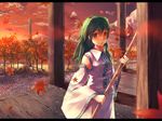  akino_komichi autumn autumn_leaves broom building detached_sleeves forest green_eyes green_hair highres holding kochiya_sanae long_hair long_sleeves looking_at_viewer nature outdoors pillar plant shrine solo sunlight sunset touhou tree 