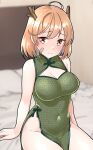  1girl ahoge alternate_costume bandaid bandaid_on_cheek bandaid_on_face bare_shoulders blush breasts brown_eyes brown_hair china_dress chinese_clothes cleavage closed_mouth commentary_request dress fake_horns furaggu_(frag_0416) green_dress hair_between_eyes highres horns kantai_collection large_breasts oboro_(kancolle) on_bed one-hour_drawing_challenge pelvic_curtain pillow short_hair sitting solo 