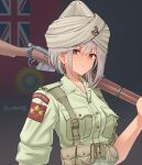  1girl absurdres artist_name belt bolt_action breast_pocket commentary flag_background green_belt green_shirt grey_hair gun highres holding holding_gun holding_weapon india indian_flag lee-enfield leochan1202 looking_at_viewer military military_uniform original patch pocket red_eyes rifle shirt shoulder_patch sleeves_rolled_up solo turban union_jack upper_body weapon world_war_ii 