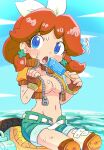  1girl bandaid bandaid_on_leg blue_eyes blue_sky bow breasts brown_hair cropped_jacket crossed_bandaids earrings fingerless_gloves food gloves green_shorts hair_bow highres holding holding_food holding_popsicle ikaheigen jacket jewelry knee_pads mario_(series) mario_kart mario_kart_world navel ocean open_clothes open_fly open_jacket open_mouth orange_gloves popsicle princess_daisy princess_daisy_(touring) shorts sky solo sweat 