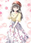  1girl absurdres alternate_costume ayaro_(genkiloobaii) beret black_hair blush braid casual collarbone commentary_request eyelashes eyes_visible_through_hair feet_out_of_frame floral_print floral_print_skirt flying_sweatdrops hair_between_eyes half_up_braid hand_up hat heaven_burns_red highres jewelry long_hair long_skirt looking_at_viewer necklace ooshima_ichiko parted_lips print_skirt red_hat shirt short_sleeves simple_background skirt solo standing white_background white_skirt wide_sleeves yellow_eyes yellow_shirt 