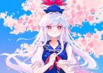  1girl blue_dress blue_hat blush bright_pupils cherry_blossoms chinese_commentary commentary_request day dress grin hands_up hat highres kamishirasawa_keine long_hair looking_at_viewer neckerchief outdoors parted_lips puffy_short_sleeves puffy_sleeves red_eyes red_neckerchief seiryo0425 short_sleeves smile solo touhou upper_body white_hair white_pupils 