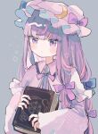  1girl blue_bow blush book bow bowtie capelet closed_mouth commentary_request crescent crescent_hat_ornament dress grey_background grimoire hat hat_bow hat_ornament hiyuu_(hiyualice) holding holding_book long_sleeves mob_cap patchouli_day patchouli_knowledge pink_bow pink_bowtie pink_capelet pink_dress pink_hat purple_eyes simple_background solo touhou upper_body wide_sleeves 