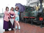  animegao cosplay ground_vehicle japanese_clothes kigurumi locomotive long_sleeves miko multiple_girls photo sabrina steam_locomotive train umbrella yagasuri 