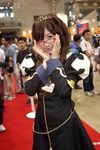  brown_hair copyright_request cosplay curly_hair glasses long_sleeves photo red-framed_eyewear smile solo_focus tiara 