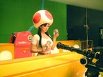  black_hair camera cosplay filming globe hat mario mario_(series) mushroom navel photo solo super_mario_bros. tank_top toad 