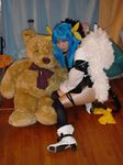  asymmetrical_wings blue_hair cosplay dizzy guilty_gear lowres pantyhose photo ribbon solo tail tail_ribbon wings 