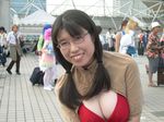  asian breasts cleavage cosplay glasses large_breasts mage_(ragnarok_online) photo ragnarok_online solo_focus teeth twintails 
