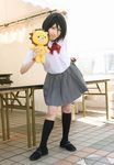  artist_request black_hair bleach cosplay hair_between_eyes kon kuchiki_rukia photo school_uniform solo stuffed_animal stuffed_lion stuffed_toy 