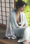  breasts highres japanese_clothes large_breasts open_clothes open_robe photo robe solo 
