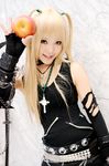  amane_misa apple bangs blonde_hair cosplay death_note food fruit holding holding_food holding_fruit kipi-san photo real_life solo torn_clothes two_side_up 
