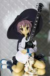  bangs bubba figure guitar hat hug instrument nagato_yuki photo shamisen_(suzumiya_haruhi) short_hair solo suzumiya_haruhi_no_yuuutsu witch_hat wonder_festival wonder_festival_2007 