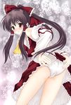  ascot ass bow brown_hair detached_sleeves hair_bow hakurei_reimu highres looking_back nagatsuki_rio panties snowflakes solo touhou underwear 