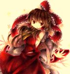  brown_eyes brown_hair detached_sleeves hakurei_reimu ribbon solo touhou wiriam07 